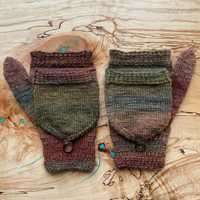 a pair of handspun fingerless mittens